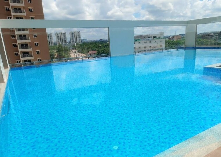 Swimming Pool, rajapushpa-regalia 3 Bedroom 1945 Sq.Ft. Apartment In Kokapet Hyderabad 8849907