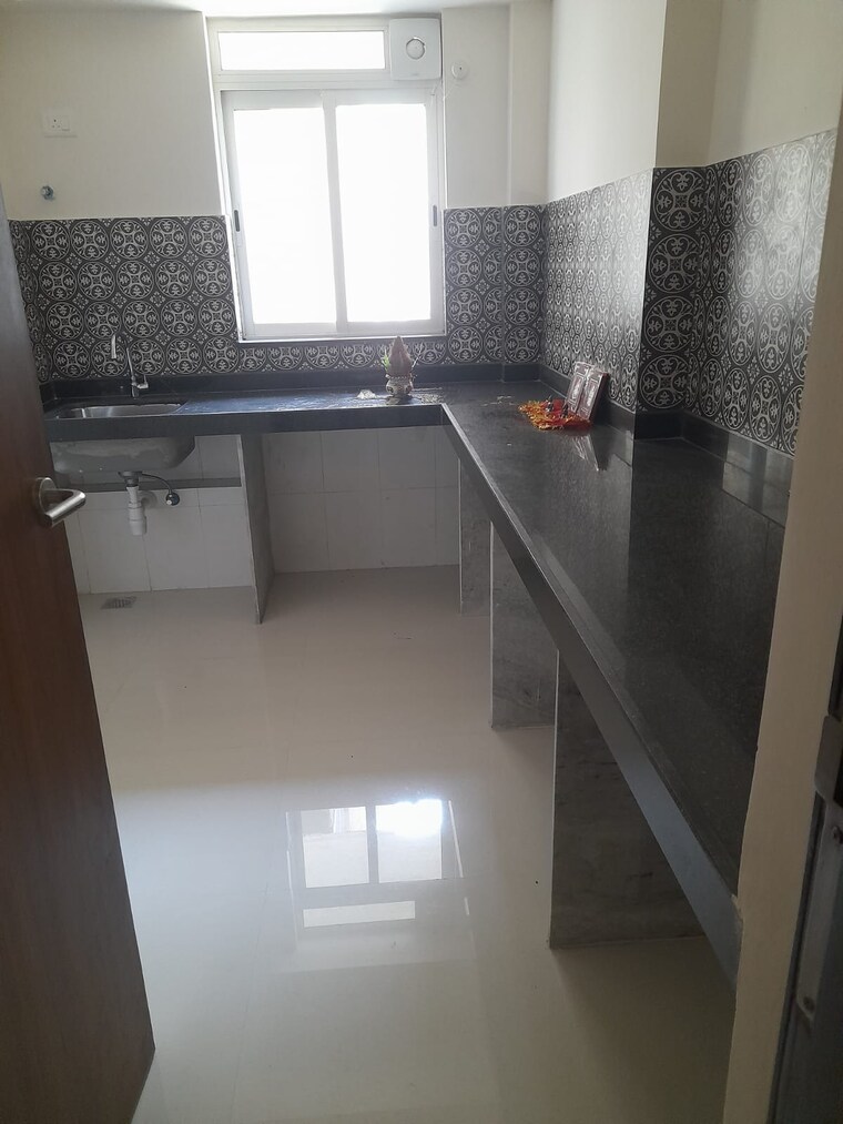 Kitchen, lodha-amara 2 Bedroom 735 Sq.Ft. Apartment In Kolshet Road Thane 8849996