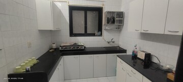 Kitchen in 2 BHK Apartment at Meethi Hill Crest Apartment, Bandra West – for Rent