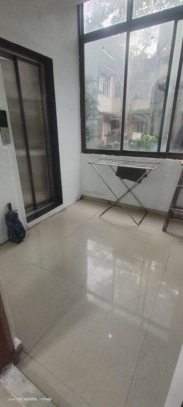 Living Room in 2 BHK Apartment at Meethi Hill Crest Apartment, Bandra West – for Rent