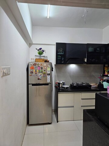 Kitchen in 2 BHK Apartment at Choice Goodwill Breeza, Dhanori – for Rent