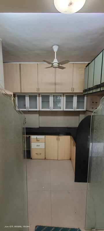 Kitchen in 2 BHK Apartment at Divine Shivom, Khar West – for Rent