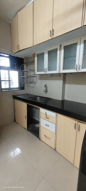 Kitchen in 2 BHK Apartment at Divine Shivom, Khar West – for Rent