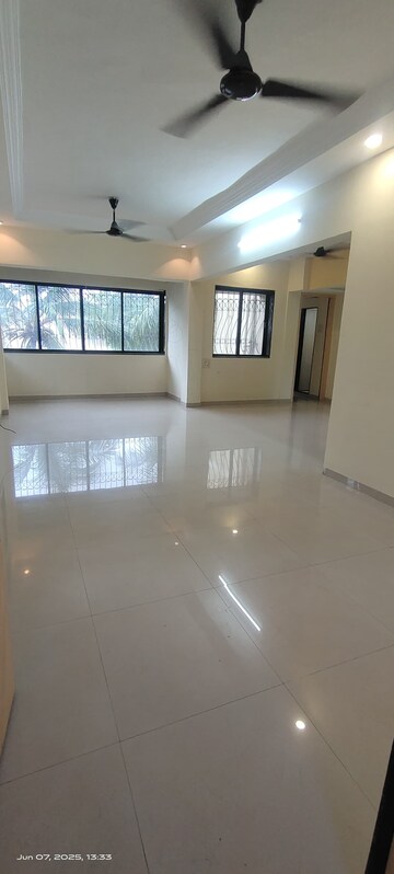 Living Room in 2 BHK Apartment at Divine Shivom, Khar West – for Rent