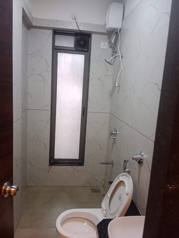 Bathroom in 2 BHK Apartment at Sosar Solitaire, Khar West – for Rent
