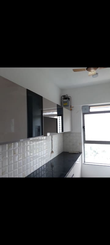 Kitchen in 2 BHK Apartment at Kalpataru Immensa, Kolshet Road – for Rent