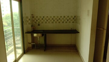 Kitchen in 1 BHK Apartment at Rudis Shivalik, Daighar Gaon – for Rent