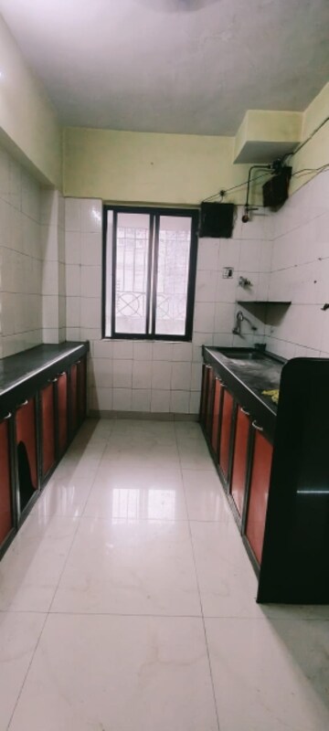 Kitchen in 1 BHK Apartment at El Plaza Apartments, Borivali West – for Rent