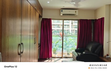 Living Room in 2 BHK Apartment at Castle Rock, Powai – for Rent