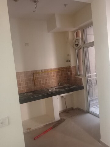 Kitchen in 2 BHK Apartment at Mahagun Mywoods, Sector 16c Greater Noida – for Rent
