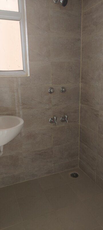 Bathroom in 2 BHK Apartment at Wave Dream Homes, Wave City – for Rent