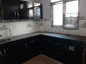 Kitchen in 2 BHK Apartment at Vikas Nagar – for Sale