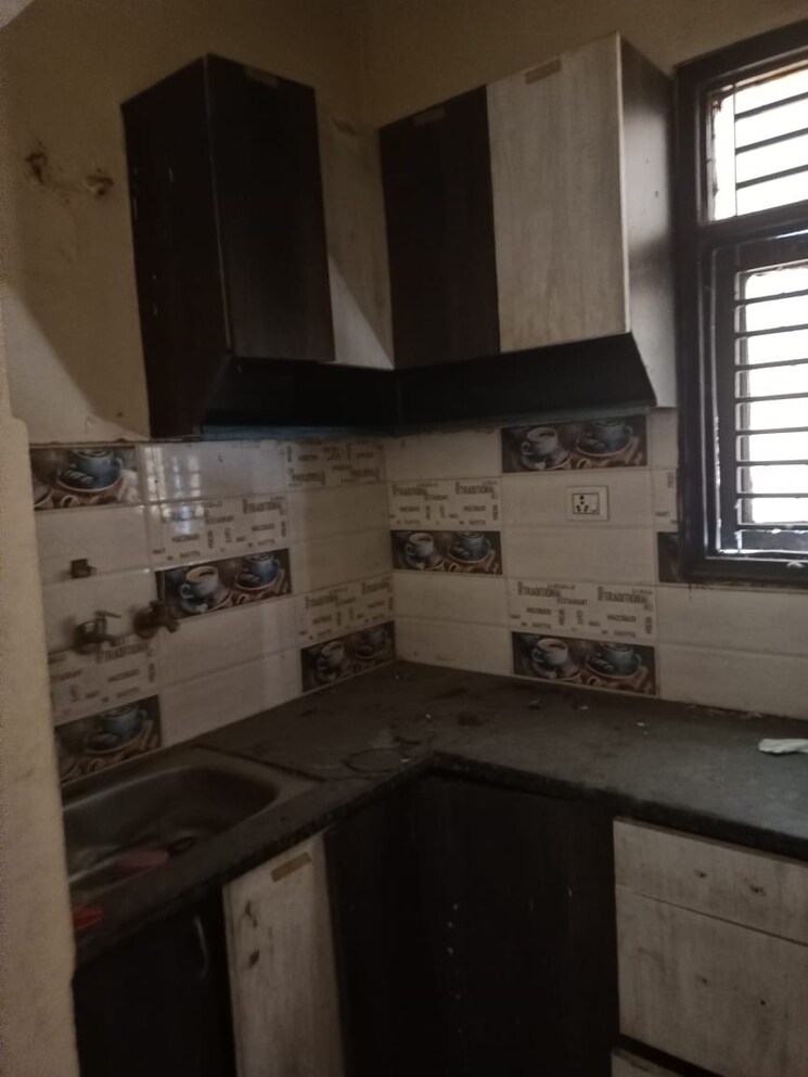 Kitchen, burari 2 Bedroom 810 Sq.Ft. Apartment In Burari Delhi 8850759
