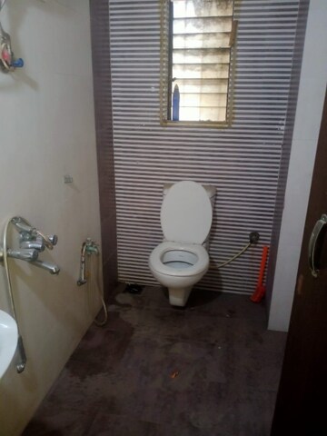 Bathroom in 1 BHK Apartment at Salasar Aangan, Mira Road – for Rent