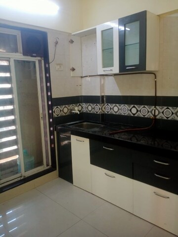 Kitchen in 1 BHK Apartment at Salasar Aangan, Mira Road – for Rent