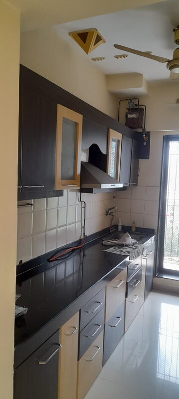 Kitchen in 2 BHK Apartment at Raunak Paradise, Kokanipada – for Rent