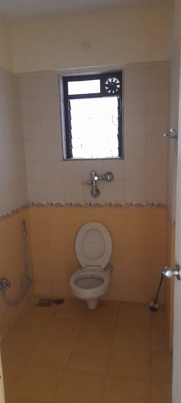 Bathroom in 2 BHK Apartment at Raunak Paradise, Kokanipada – for Rent