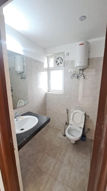 Bathroom in 3 BHK Apartment at Adani M2K Oyster Grande, Sector 102 – for Sale