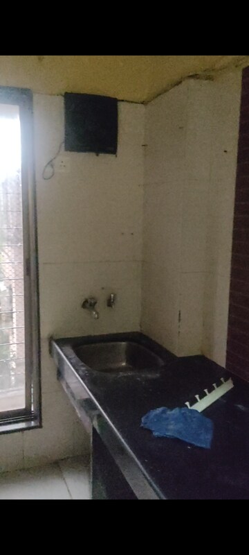 Kitchen in 1 BHK Apartment at Suraj Towers, Mira Road – for Rent