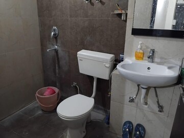 Bathroom in 1.5 BHK Apartment at Techman Moti Residency, Raj Nagar Extension – for Sale