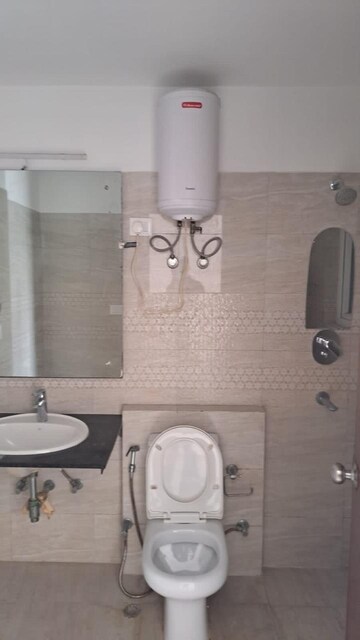 Bathroom in 3 BHK Apartment at Adani M2K Oyster Grande, Sector 102 – for Sale