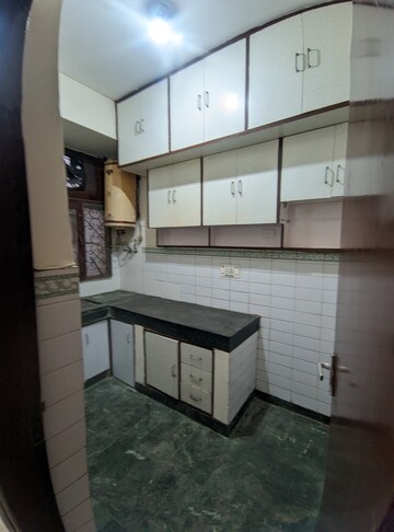 Kitchen in 2 BHK Apartment at Eros Southend Apartments, Charmwood Village – for Rent