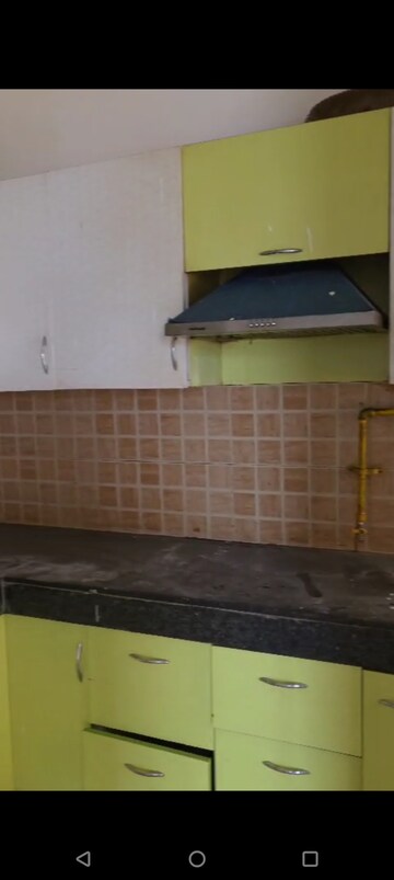Kitchen in 2.5 BHK Apartment at Mahagun Mywoods, Sector 16c Greater Noida – for Rent