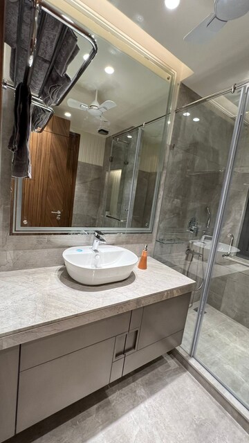 Bathroom in 3 BHK Apartment at Defence Colony – for Rent