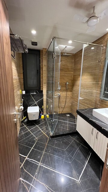 Bathroom in 3 BHK Apartment at Defence Colony – for Rent