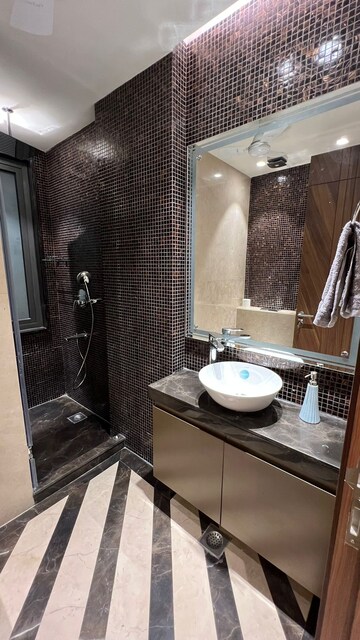 Bathroom in 3 BHK Apartment at Defence Colony – for Rent