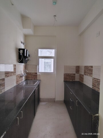 Kitchen in 2 BHK Apartment at Amrapali Enchante, Tech Zone 4 Greater Noida – for Sale