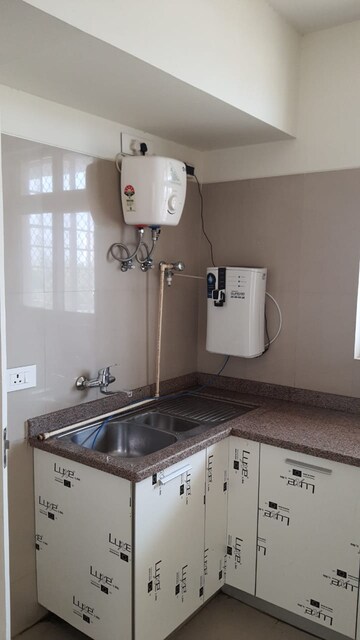Kitchen in 4 BHK Apartment at Emaar Palm Terraces Select, Sector 66 – for Rent