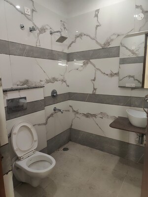Bathroom in 3 BHK Apartment at Dhakoli – for Sale
