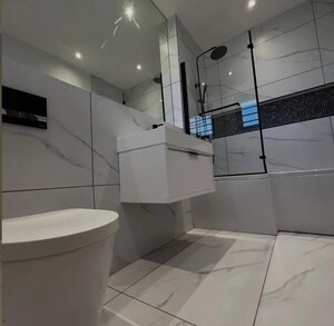 Bathroom in 3.5 BHK Builder Floor at Sector 29 – for Sale