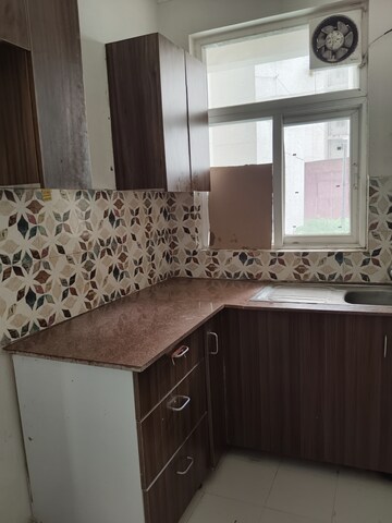 Kitchen in 2 BHK Apartment at Amrapali Leisure Park, Amrapali Leisure Valley – for Rent