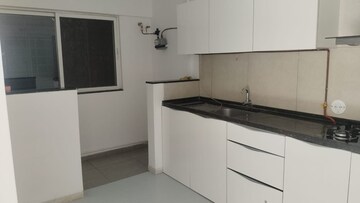 Kitchen in 2 BHK Apartment at Kolte Patil 24K Glitterati 2, Pimple Nilakh – for Rent