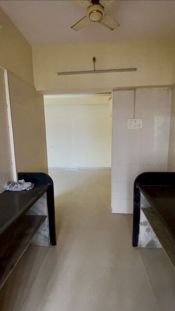 Kitchen in 2 BHK Apartment at Unique Poonam Estate, Mira Road – for Sale