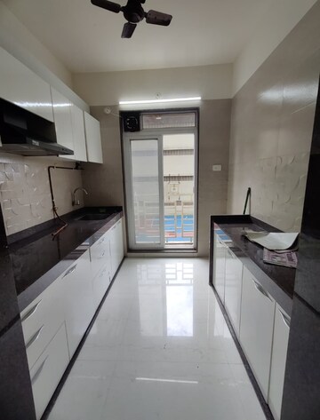 Kitchen in 1.5 BHK Apartment at Juhi Serenity, Ghansoli – for Rent