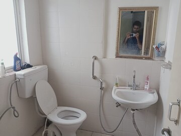 Bathroom in 3 BHK Apartment at Conscient Habitat 78, Sector 78 – for Rent
