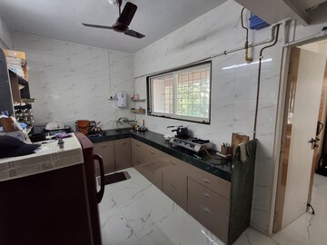 Kitchen in 1 BHK Apartment at Karan Ashiyana, Wadgaon Sheri – for Rent