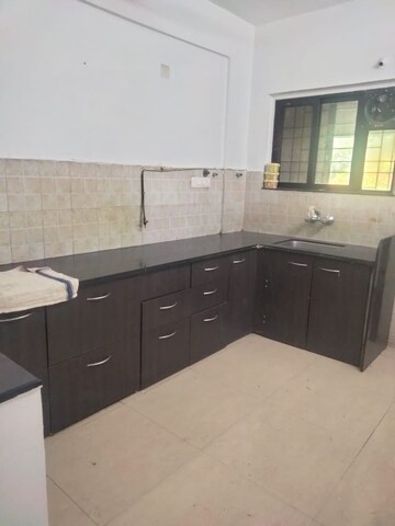 Kitchen in 2 BHK Apartment at Brahma Suncity, Wadgaon Sheri – for Rent