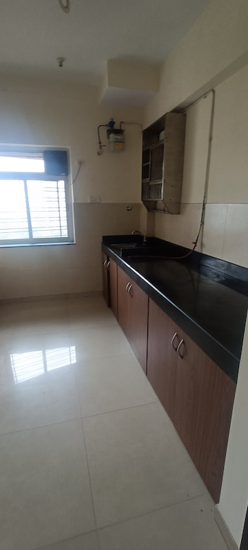 Kitchen in 2 BHK Apartment at Kalpataru Hills, Manpada – for Sale