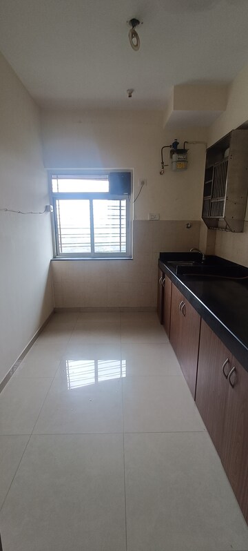 Kitchen in 2 BHK Apartment at Kalpataru Hills, Manpada – for Sale