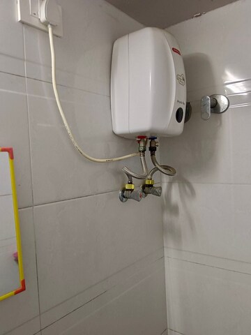 Bathroom in 1 BHK Apartment at Maitreyee CHS, Goregaon East – for Rent