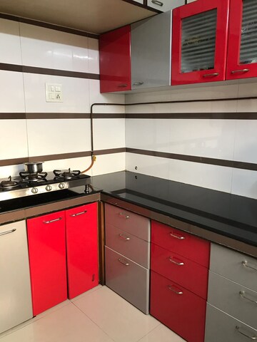 Kitchen in 3 BHK Apartment at Cosmos Sankalp Heights, Uthalsar – for Rent