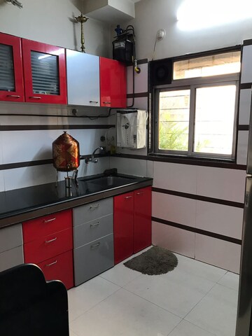 Kitchen in 3 BHK Apartment at Cosmos Sankalp Heights, Uthalsar – for Rent