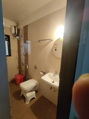 Bathroom in 2.5 BHK Apartment at Shree Satya Shankar Residency, Manpada – for Sale