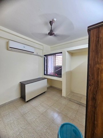 Bedroom in 1 BHK Apartment at Megh Malhar Co-op Housing Society, Ghansoli – for Rent