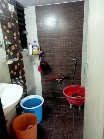 Bathroom in 1 BHK Apartment at Salasar Aangan, Mira Road – for Rent
