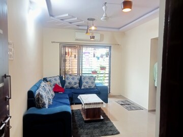 Living Room in 1 BHK Apartment at Salasar Aangan, Mira Road – for Rent
